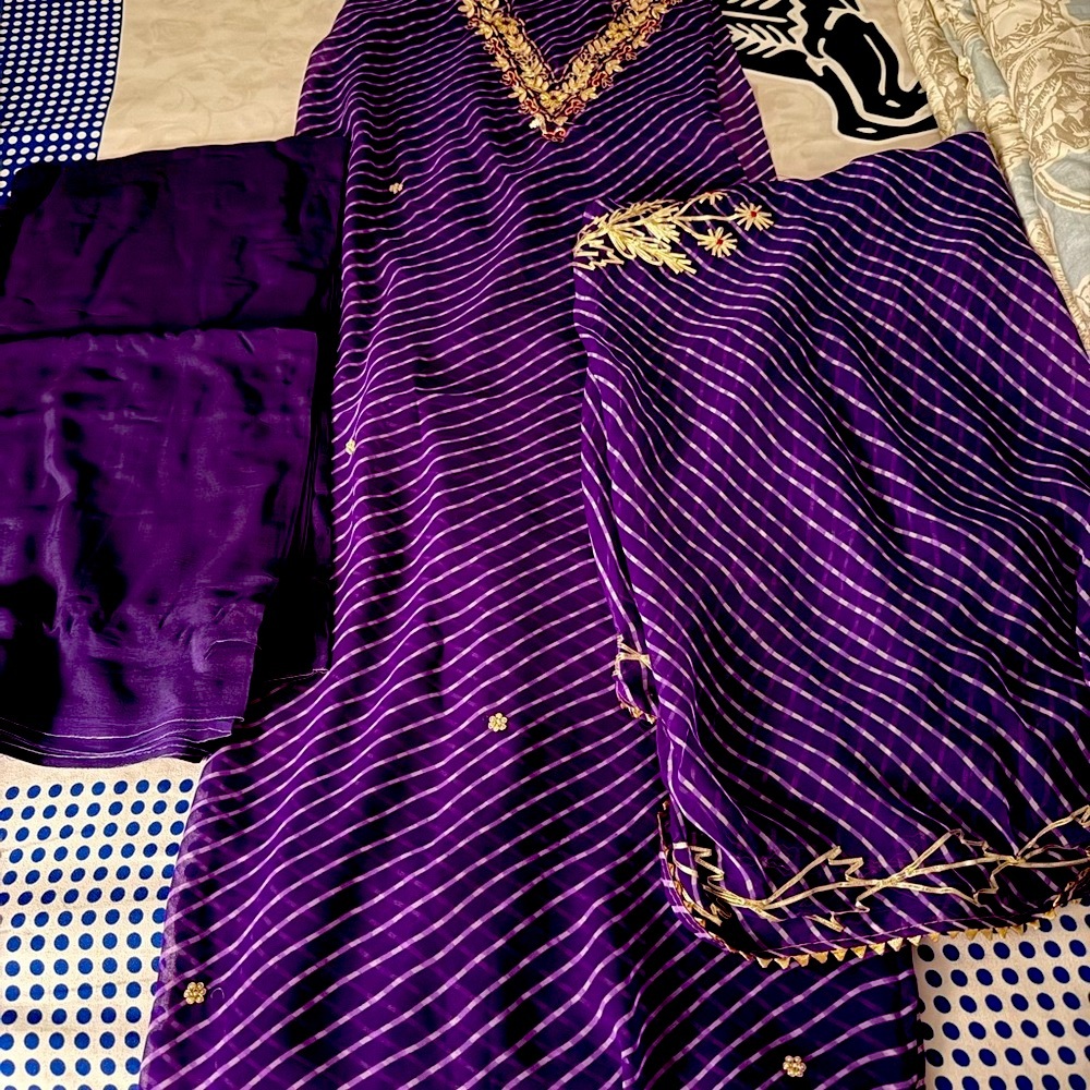 Purple Embroidered unstitched suit set with Gold Accents